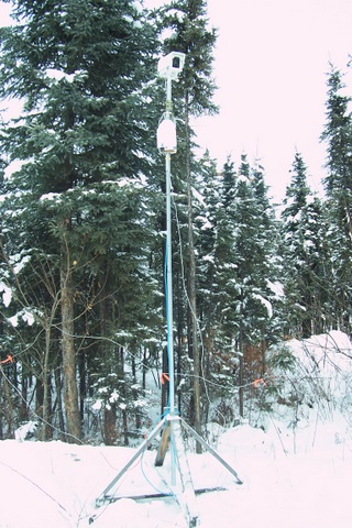 100_4282 That's my baby over there on the pole. That white box houses the circuitry for both the pan and tilt functions.