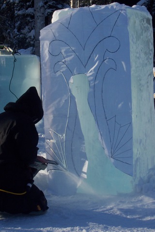 100_4332 Artist impressing the cartoon into the ice...