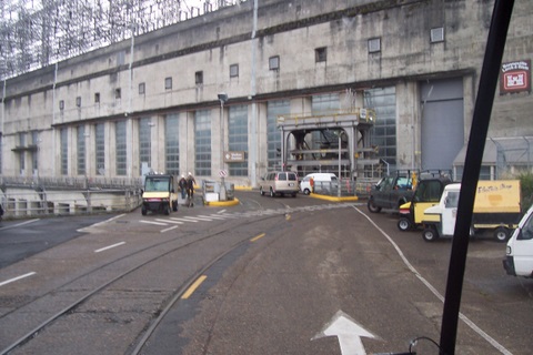 Driving my RV past the dam's power house. Spillways on the left.