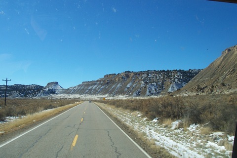 Back on the road. I've gained some altitude so there is snow.